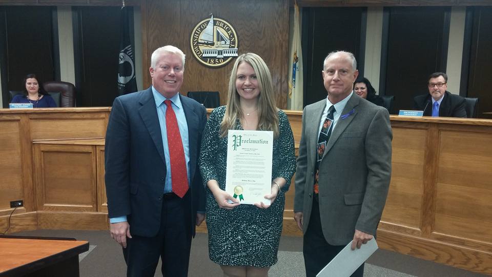 Brittany Bucco (center) with Mayor John Ducey (left) and Council President Paul Mummolo. (Photo: Brick Twp.)