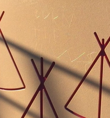 An anti-Semitic statement carved into playground equipment in Toms RIver. (Photo: TRPD)