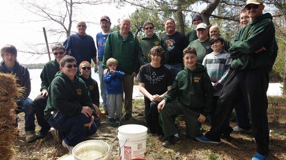 Volunteers plant native plants that will attract monarch butterflies to Windward Beach Park. (Submitted Photo)