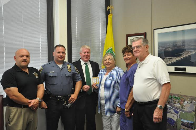 Mayor John Ducey receives his tickets for the bulletproof vest fund dance. (Photo: Brick Rotary)