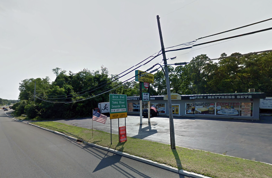 The former Furniture Source building, which is proposed to be rehabilitated into a professional building. (Credit: Google Maps)