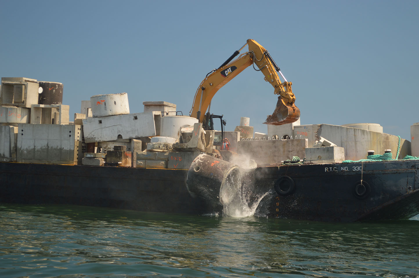Structure is deployed into the ocean as part of the Manasquan Inlet Reef. (Photo: Daniel Nee)
