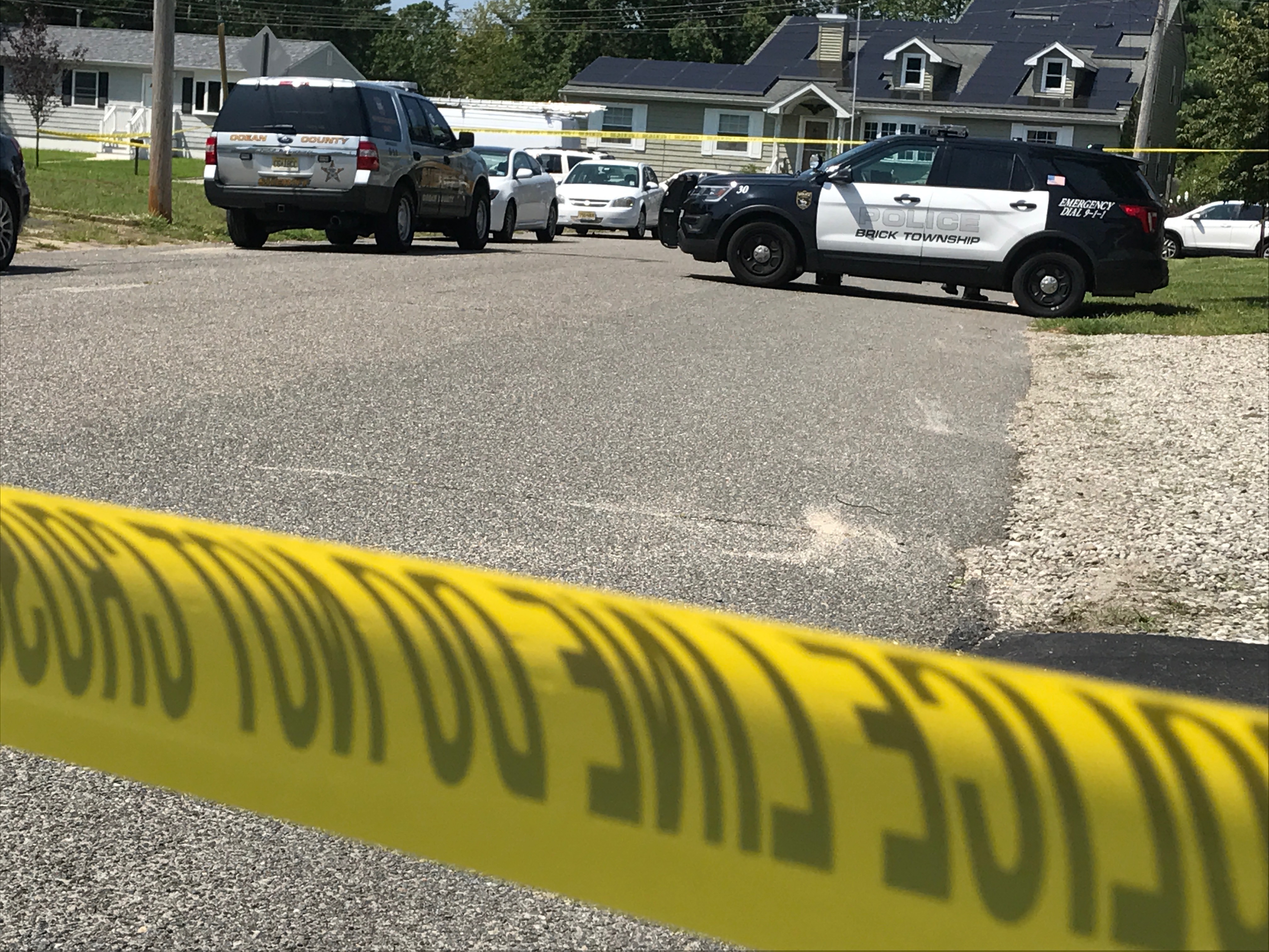 Police activity near the home where a man was shot by officers, Sunday, Aug. 20, 2017. (Photo: Daniel Nee)