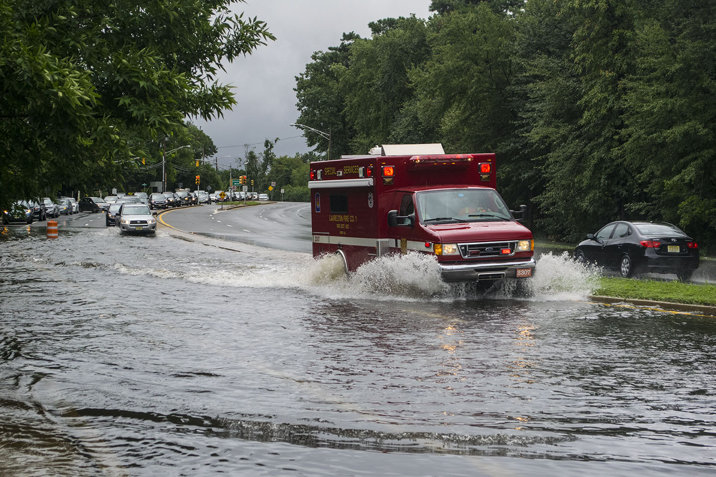 An emergency vehicle makes its way down Burnt Tavern Road in Brick, Aug. 13, 2018. (Photo: Daniel Nee)