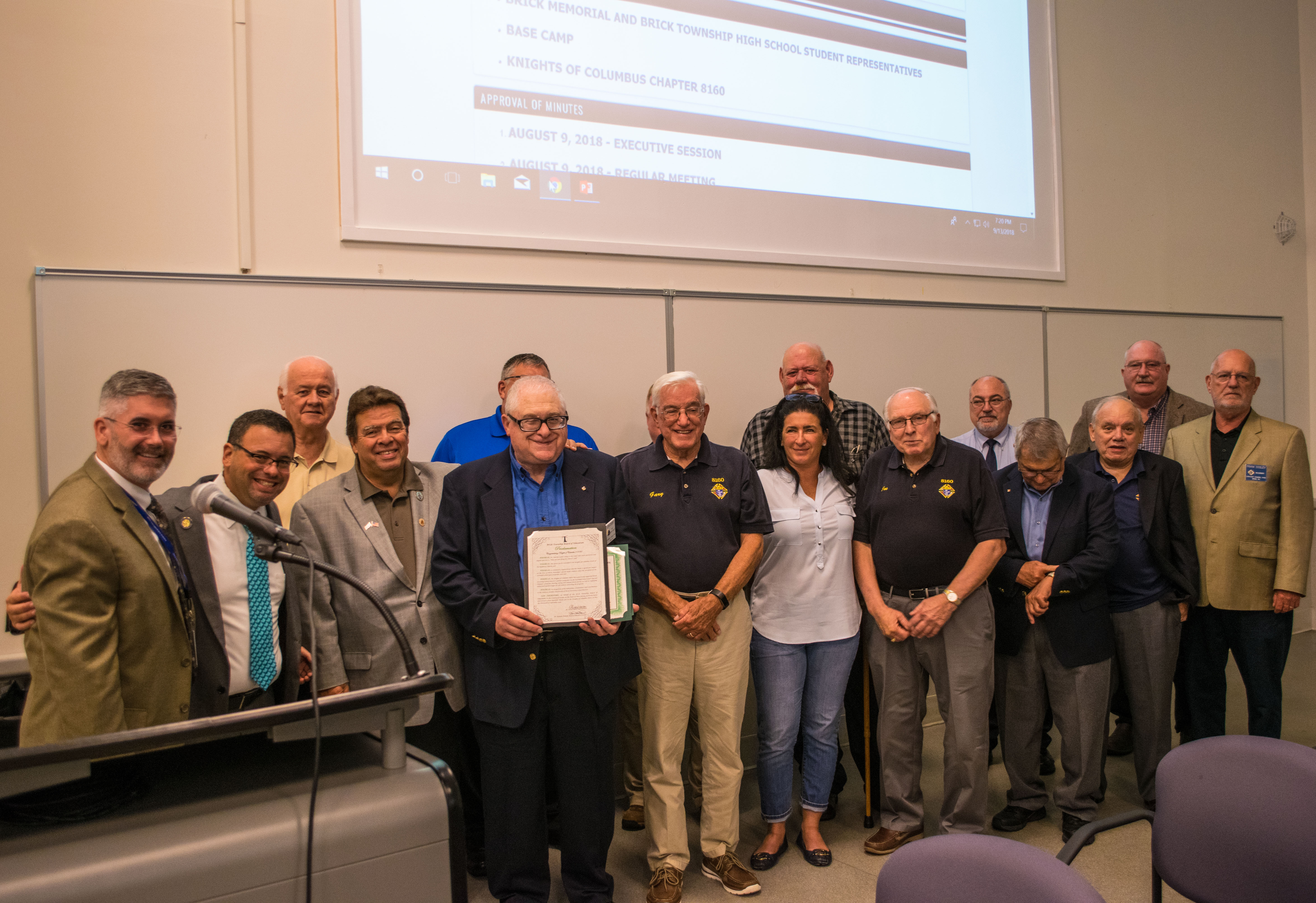 Members of Knights of Columbus Council 8160, of Brick, N.J., receive an award for their work with a summer program for special needs children. (Photo: Daniel Nee)