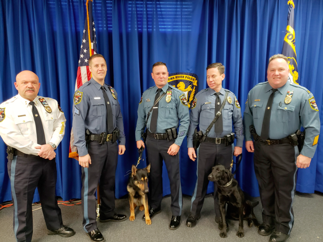 Brick Township Police, from left to right: Chief James Riccio, Sgt. Paul Catalina, K9 Echo, Ptl. Scott Smith, Ptl. John Turrin, K9 Vader, and Captain Steve Gerling.