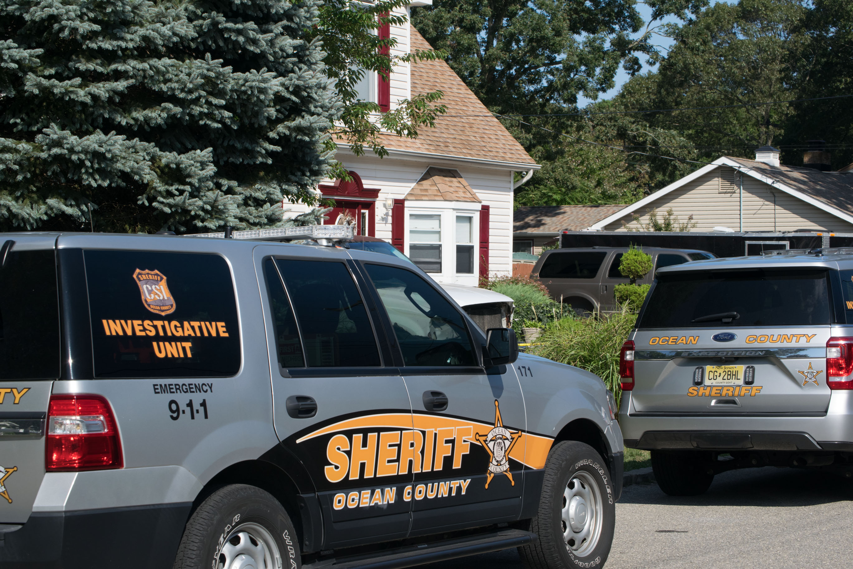 Ocean County Sheriff's Department vehicles outside the site of a suspected homicide in Brick. (Photo: Daniel Nee)