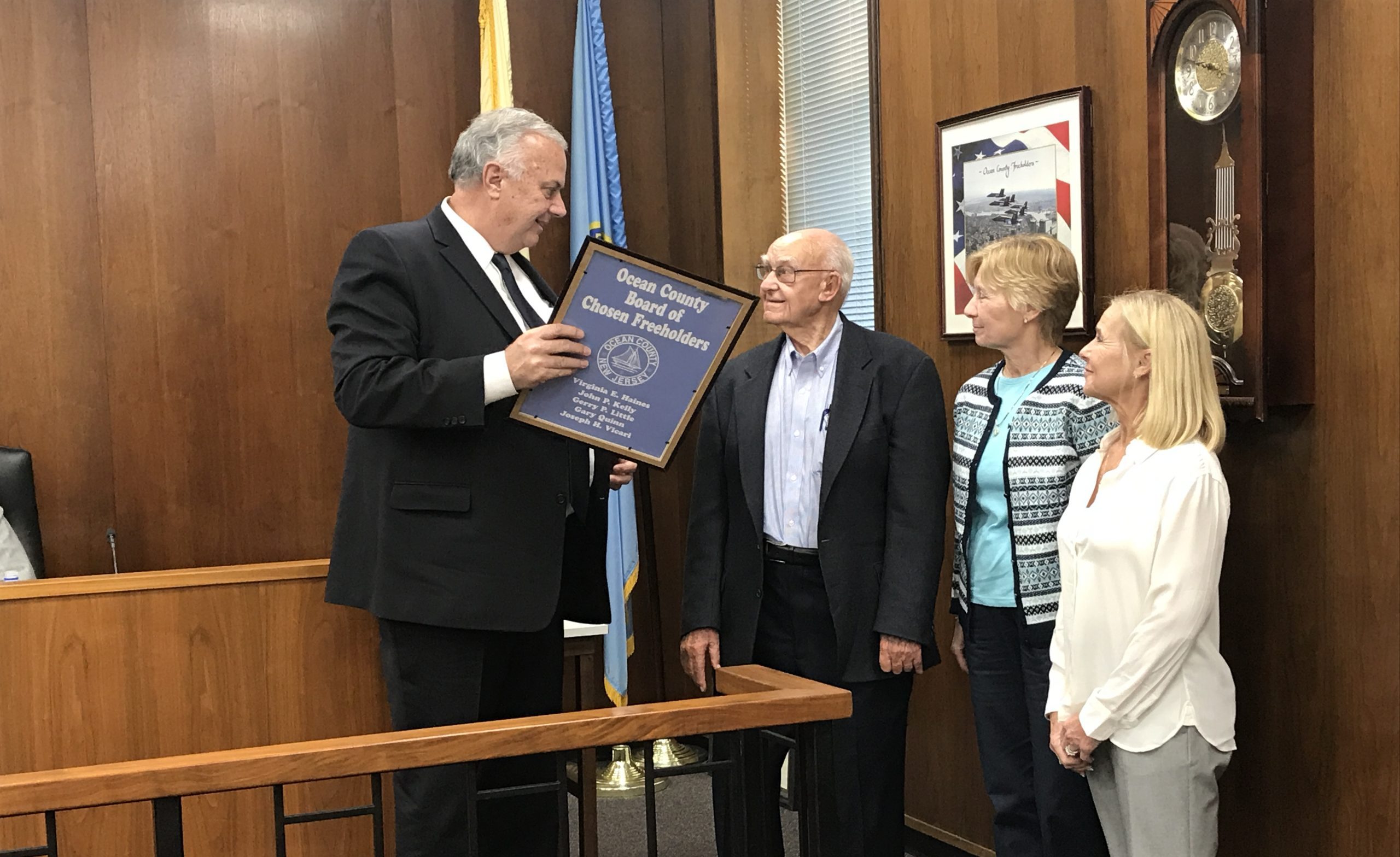 Freeholder Gary Quinn honors retiring OC Planning Board member Donald Bertrand. (Photo: Daniel Nee)