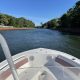 A boat traverses the Point Pleasant Canal, Summer 2021. (Photo: Daniel Nee)