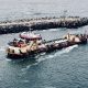 The USACE dredge boat Murden clears a channel through Manasquan Inlet, Feb. 6, 2023. (Photo: Daniel Nee)