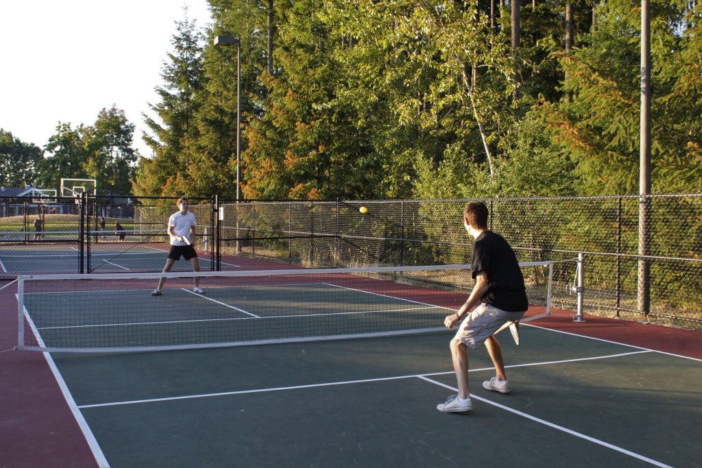 Men wearing black T-shirts, Men wearing shorts, Men wearing white T-shirts, Pickleball courts, Pickleball players, Self-published work
