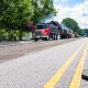 A paving crew works on a residential street. (File Photo: Creative Commons/ Greenville)