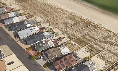 An aerial photo of the marked home, slated for reconstruction, in question. (Google Earth)