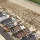 An aerial photo of the marked home, slated for reconstruction, in question. (Google Earth)