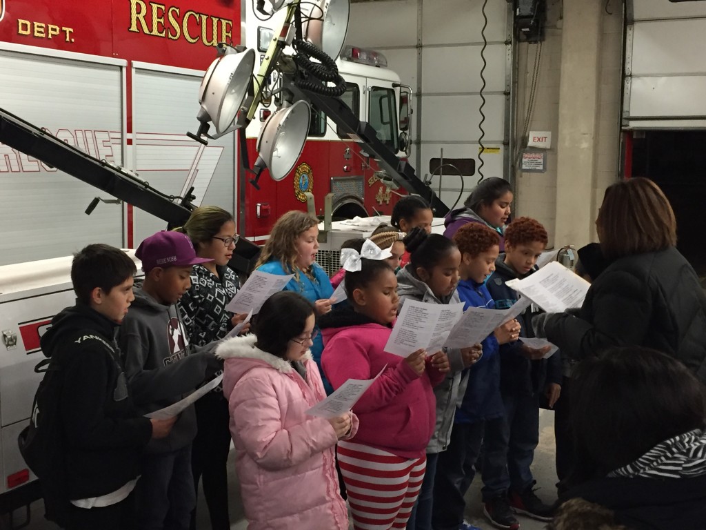 Children from Seaside Heights perform Christmas carols at the borough's annual tree lighting, Dec. 4, 2015. (Photo: Daniel Nee)