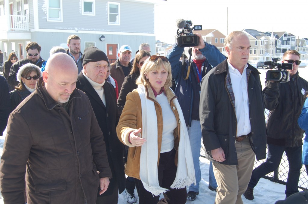 U.S. Rep. Tom MacArthur, Toms River Mayor Thomas Kelaher, Lt. Gov. Kim Guadagno and DEP Commissioner Bob Martin tour the Ortley Beach boardwalk, Jan. 25, 2016. (Photo: Daniel Nee)