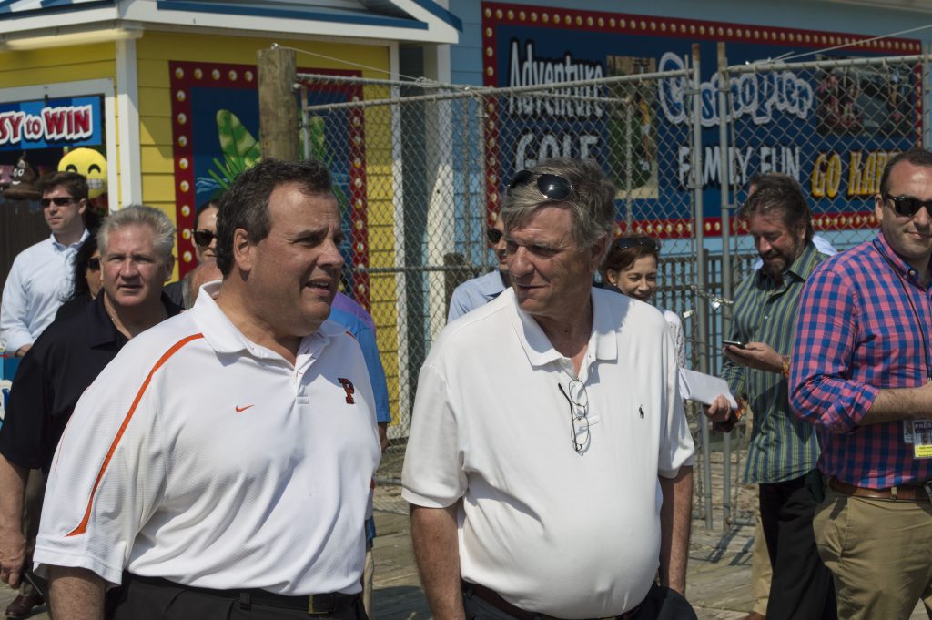 Ocean County GOP Chairman George R. Gilmore walks with Gov. Chris Christie on the Seaside Heights boardwalk. (Photo: Daniel Nee)