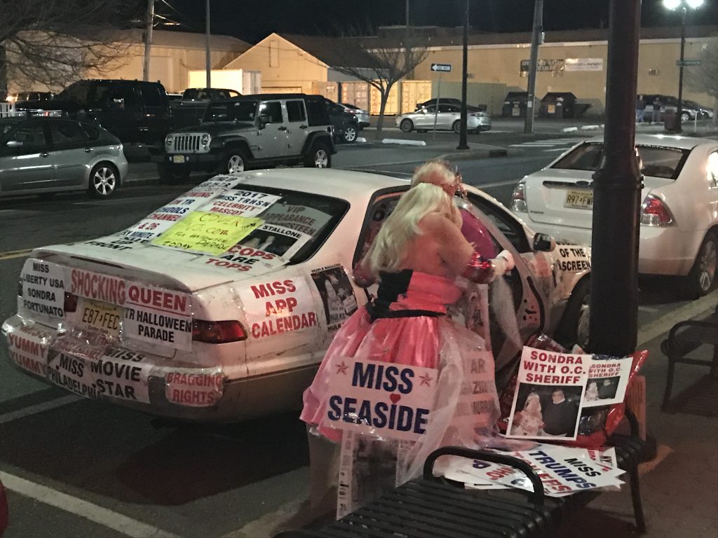 Sondra Fortunato sets up signs on her vehicle outside Bamboo Bar in Seaside Heights, Feb. 18, 2017. (Photo: Daniel Nee)