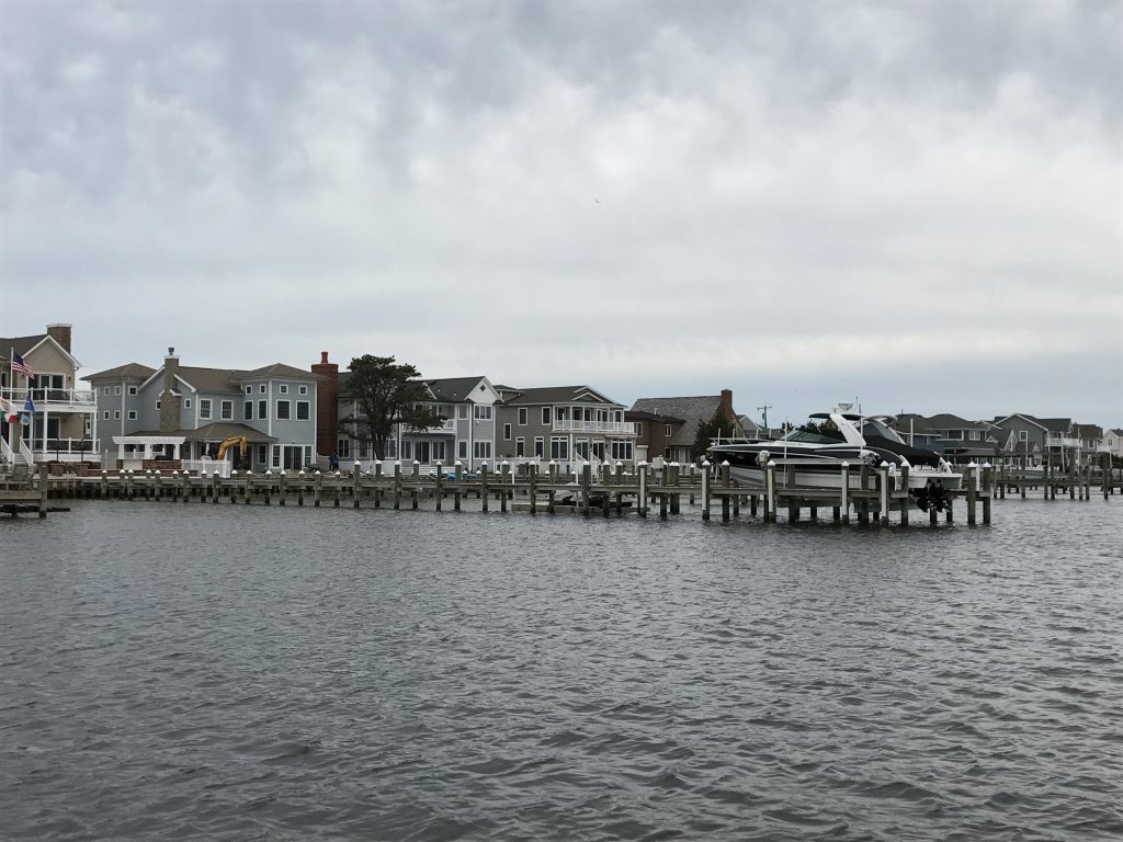 A boat dock extends out into Barnegat Bay. (Photo: Daniel Nee)