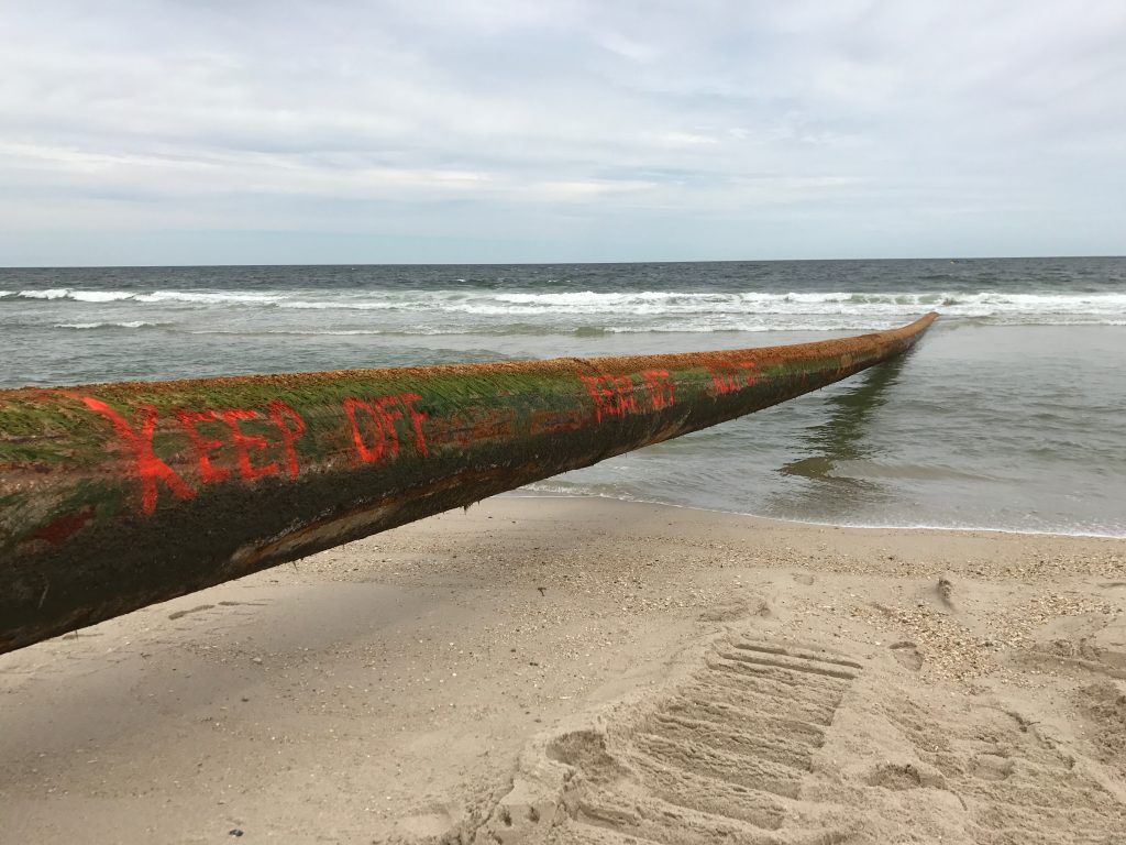 A dredge pipe set up on Ortley Beach, May 11, 2017. (Photo: Daniel Nee)