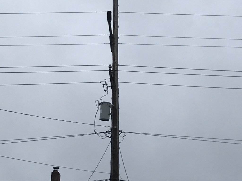 An utility pole with electrical equipment. (Photo: Daniel Nee)