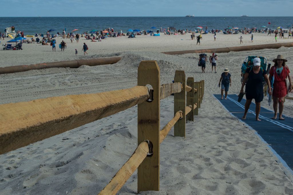 Beachgoers enter the newly-designed beachfront in Ortley Beach, Sept. 1, 2018. (Photo: Daniel Nee)
