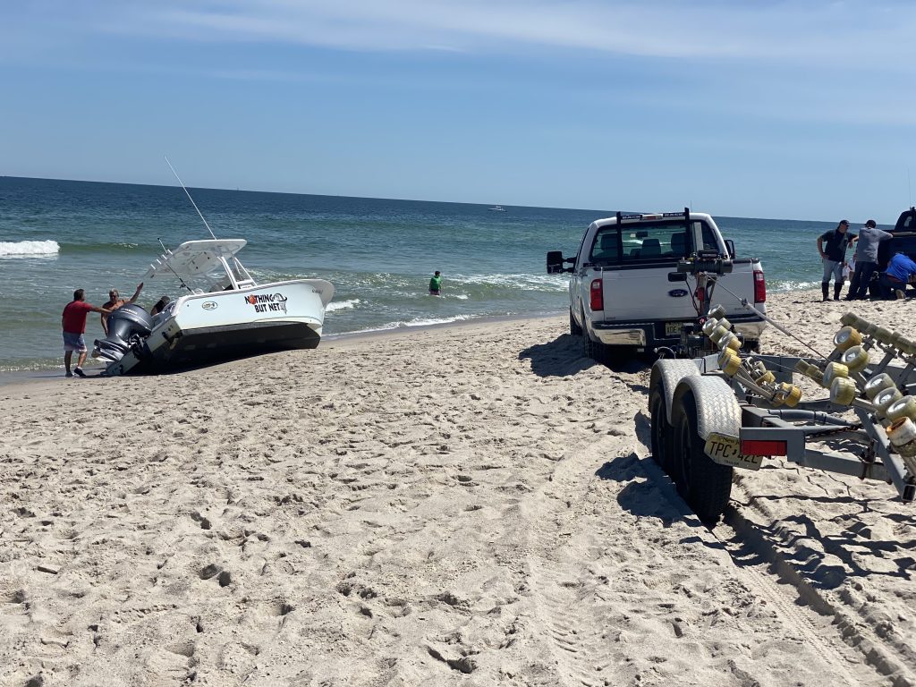 Friends Jay DeBenedict and Robert Riley made it to shore in this boat after being hit by a whale, June 8, 2020. (Photo: Jay DeBenedict)