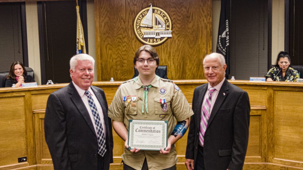 Brick Mayor John Ducey and Councilman Paul Mummolo recognize Eagle Scout Matthew Nugent. (Photo: Daniel Nee)