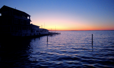 The sun sets over Barnegat Bay in the Ocean Beach Shores neighborhood of Toms River, Feb. 11, 2022. (Photo: Daniel Nee)