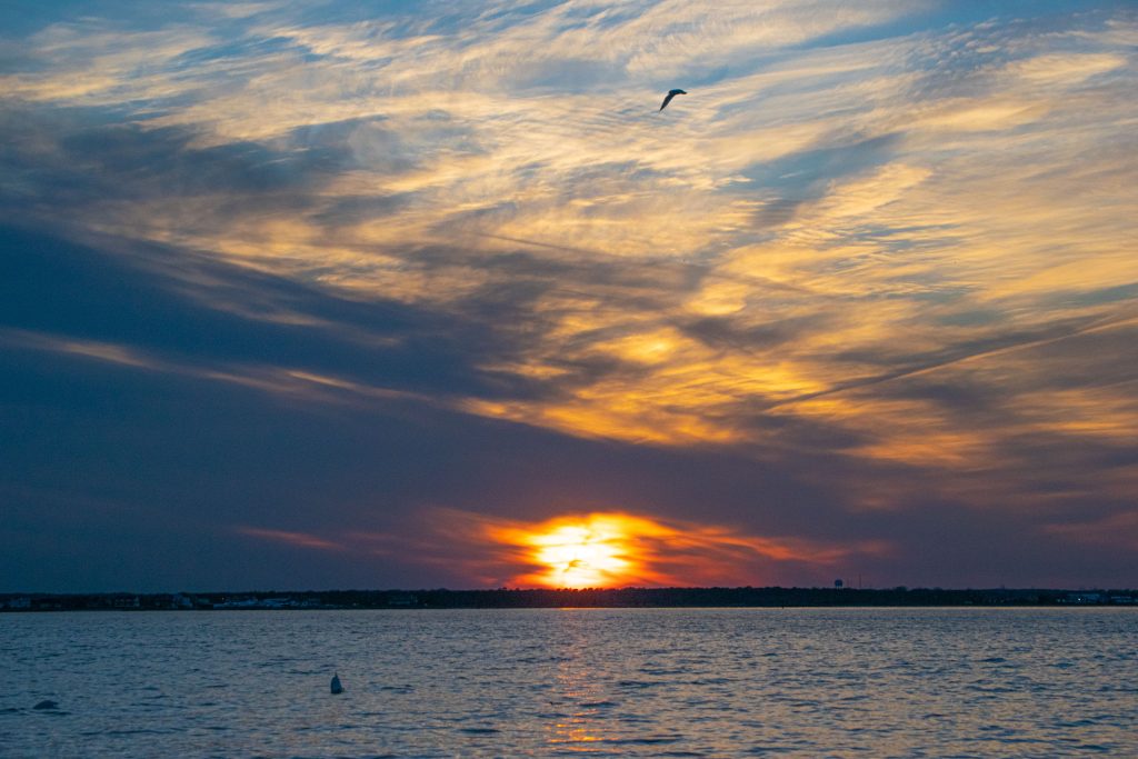 A glowing sunset with signs of spring, Feb. 26, 2022, in Seaside Park, N.J. (Photo: Daniel Nee)