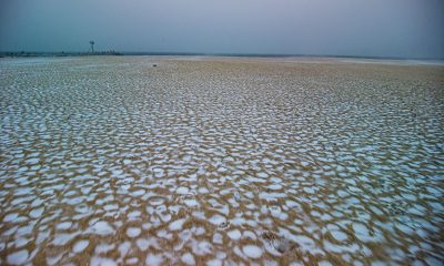 A frozen beach in Point Pleasant Beach, N.J., during a storm March 12, 2022. (Photo: Daniel Nee)