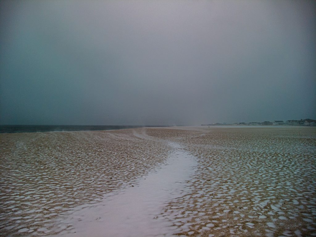 A frozen beach in Point Pleasant Beach, N.J., during a storm March 12, 2022. (Photo: Daniel Nee)