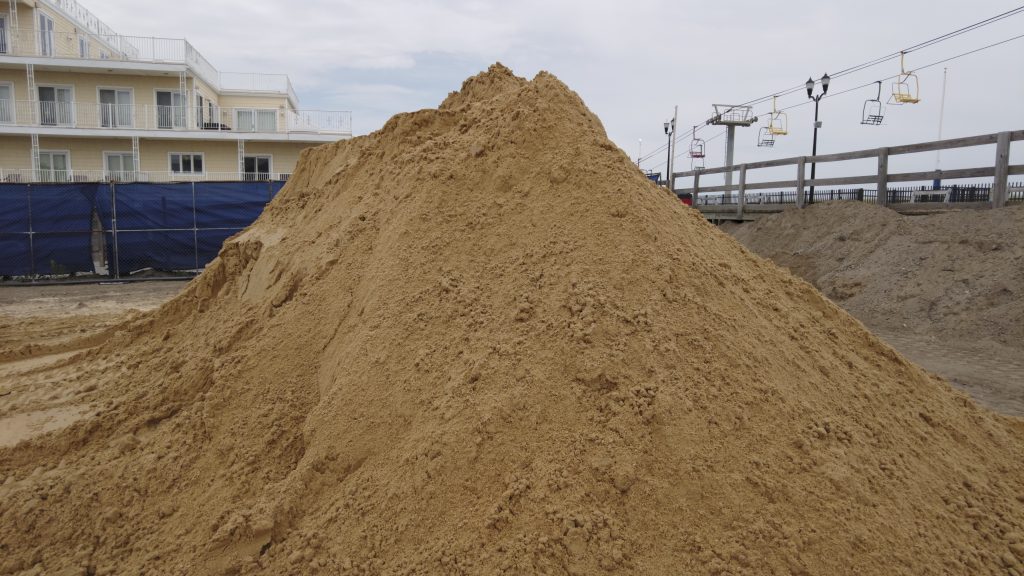 Truckloads of 150 tons of sand were delivered to Seaside Heights, June 21, 2022. (Photo: Daniel Nee)