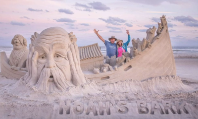 John and Laura Gowdy show off one of their famous sand sculptures. (Photo: Laura Gowdy/Instagram)