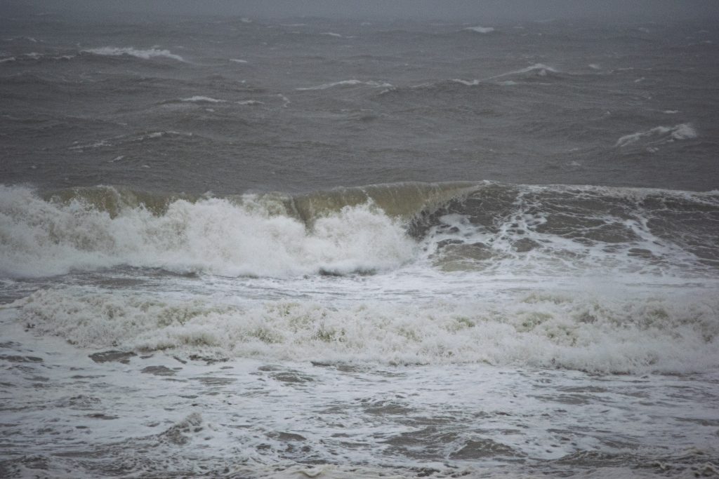 Heavy surf generated by the remnants of Hurricane Ian pound the shoreline in Ocean County, N.J., Oct. 2, 2022. (Photo: Daniel Nee)