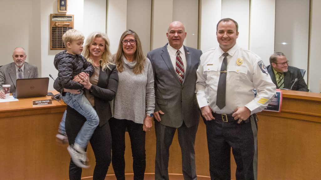 Police Chief Christian LaCicero, Mayor Walter LaCicero, and their family as Christian LaCicero is sworn in as Lavallette police chief, Nov. 14, 2022. (Photo: Daniel Nee)