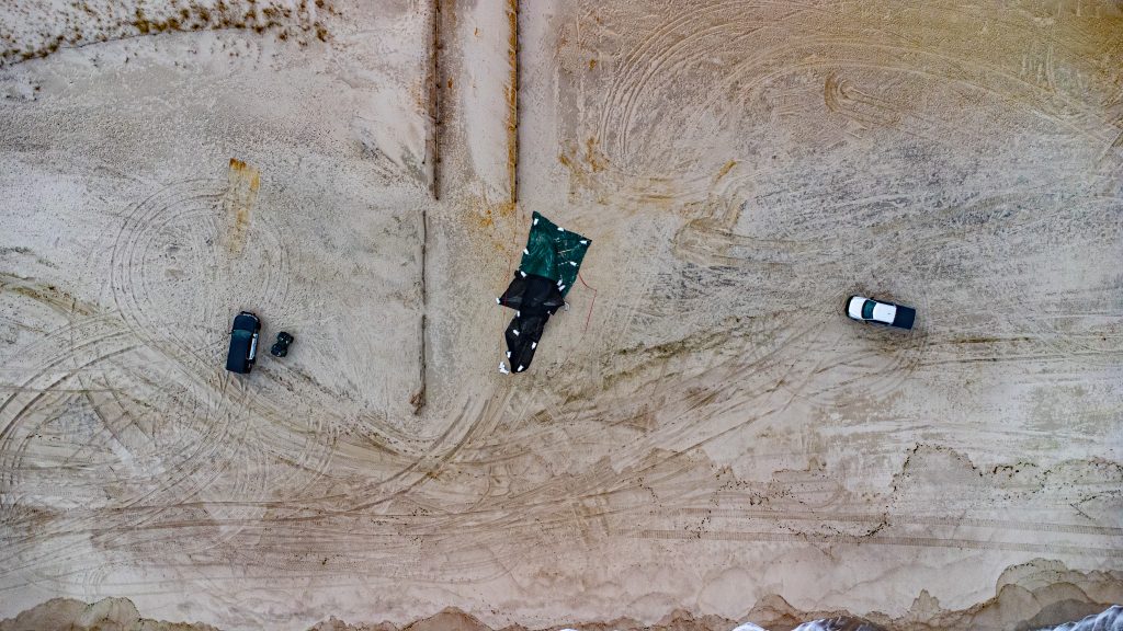 A whale washes ashore at Funtown Beach, Seaside Park, N.J., March 2, 2023. (Photo: Daniel Nee)