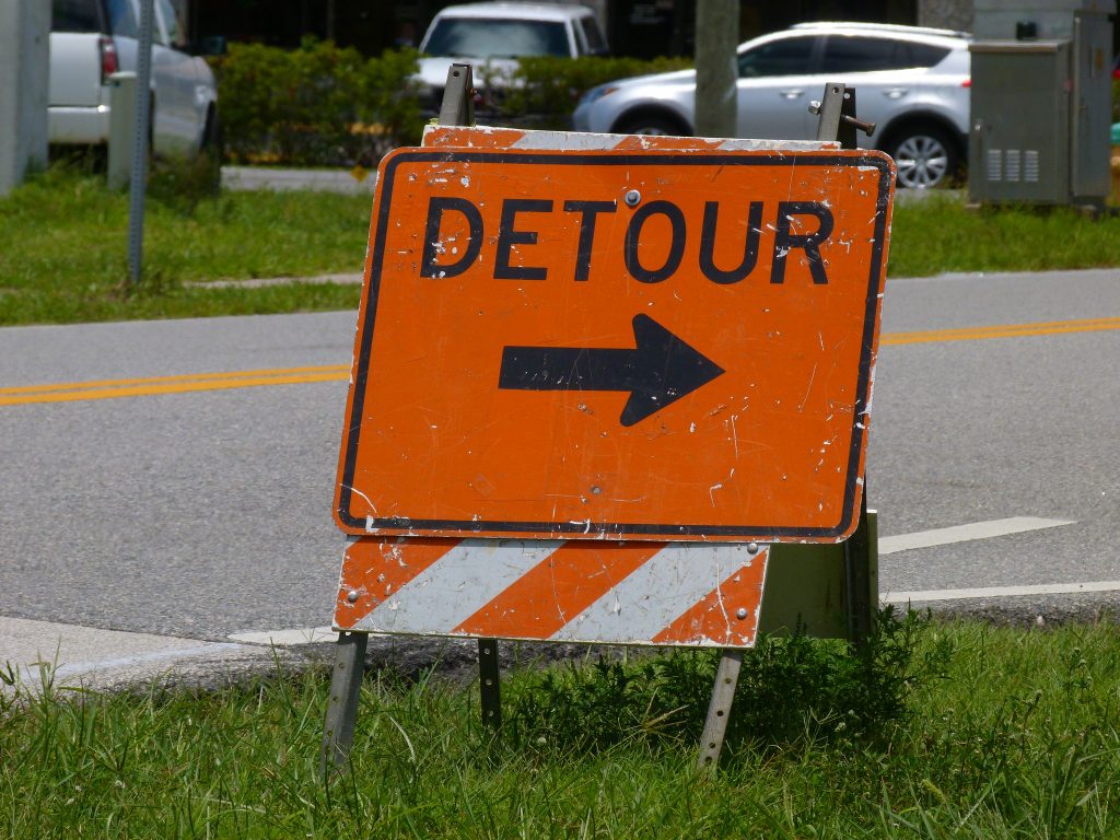 Road paving detour sign. (Credit: Rusty Clark/ Creative Commons)