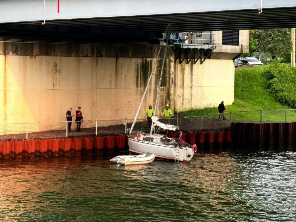 Crews rescue a sailboat wedged under the Route 88 bridge in Point Pleasant Borough, June 6, 2025. (Credit: Point Pleasant Borough Fire Department)
