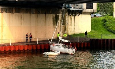 Crews rescue a sailboat wedged under the Route 88 bridge in Point Pleasant Borough, June 6, 2025. (Credit: Point Pleasant Borough Fire Department)