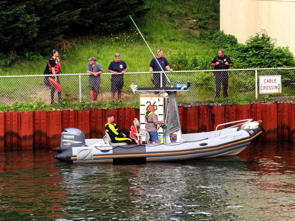 Crews rescue a sailboat wedged under the Route 88 bridge in Point Pleasant Borough, June 6, 2025. (Credit: Point Pleasant Borough Fire Department)