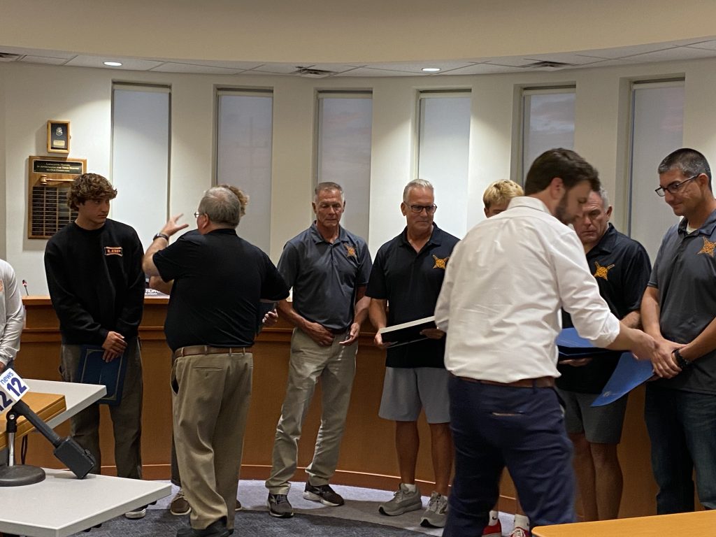 New Jersey State Assemblyman Paul Kanitra honors Lavallette lifeguards involved in the rescue of 20 children in Aug. 2025. (Photo: Barbara Sussino)