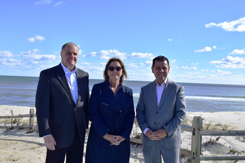 Representatives from Arya Properties and Berkeley Township mark the donation of a new public beach in South Seaside Park. (Photo: Arya Properties)