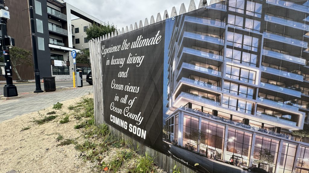 A sign advertising redevelopment at the 'steel structure' site on the Boulevard in Seaside Heights, Sept. 2025. (Photo: Shorebeat)
