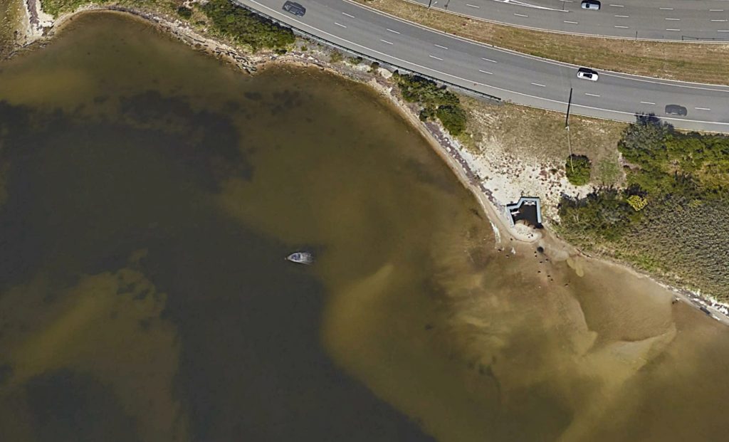 A sailboat abandoned in Seaside Park since 2024. (Google Earth)