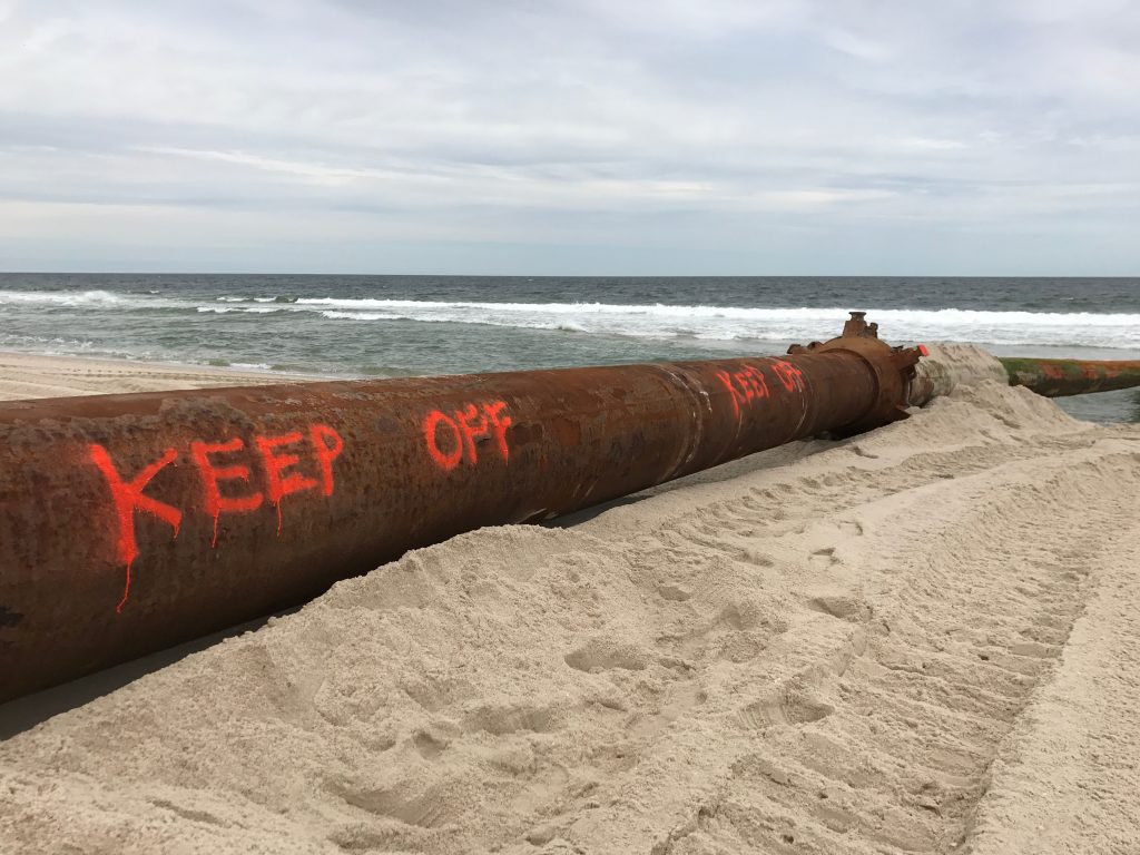 A dredge pipe set up on Ortley Beach, May 11, 2017. (Photo: Daniel Nee)