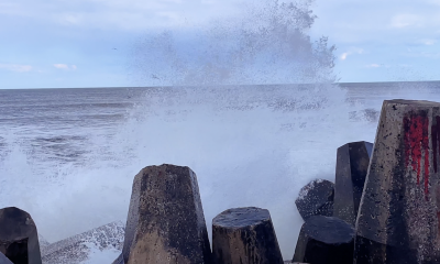 A wave crashes against the rocks at Manasquan Inlet, April 19, 2022. (Photo: Daniel Nee)