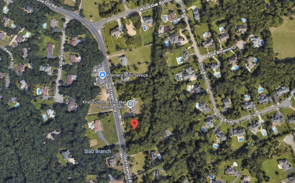 The property on which a house of worship is seeking approval in a residential zone in Toms River, N.J. (Google Earth)